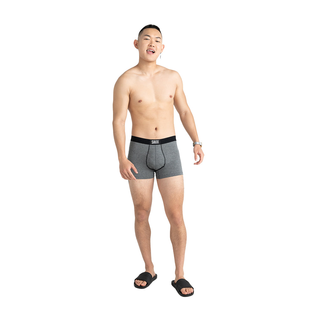 on-model-shot-of-saxx-vibe-boxer-briefs-in-grey