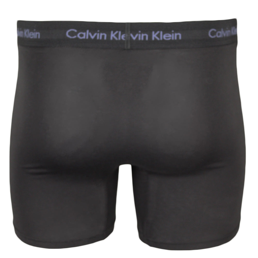 Calvin Klein boxer brief in black with coloured lettering on waistband, back view