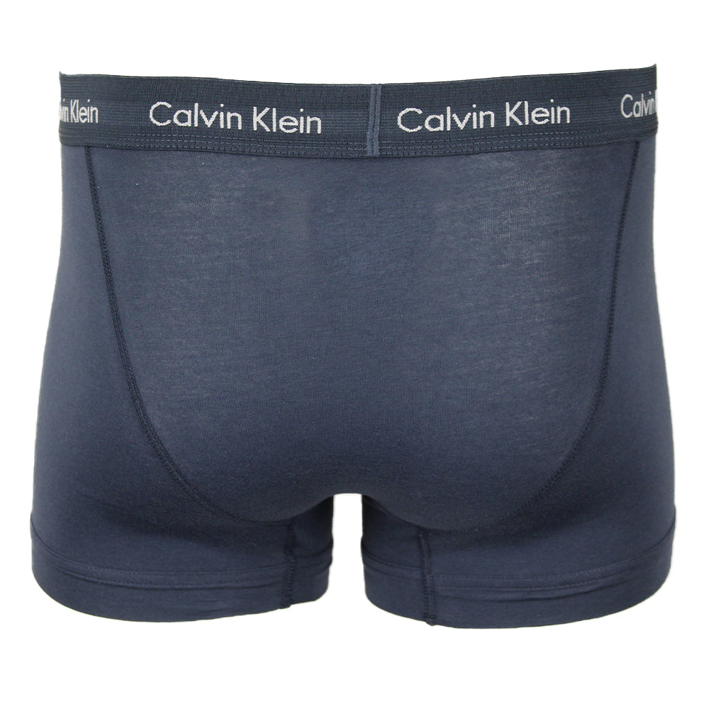 Dark blue Calvin Klein boxer trunk with white logo waistband, back view