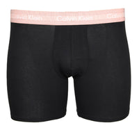 Black Calvin Klein boxer brief with pale pink waistband