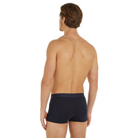 back-of-mens-tommy-hilfiger-navy-boxer-trunks-on-model