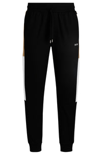 Cotton-terry tracksuit bottoms with contrast side panels, Black